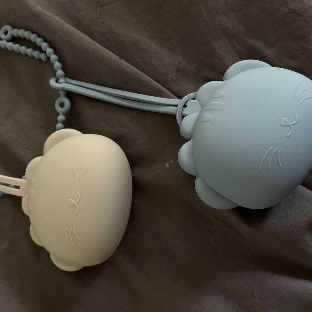 Baby pacifier holders
